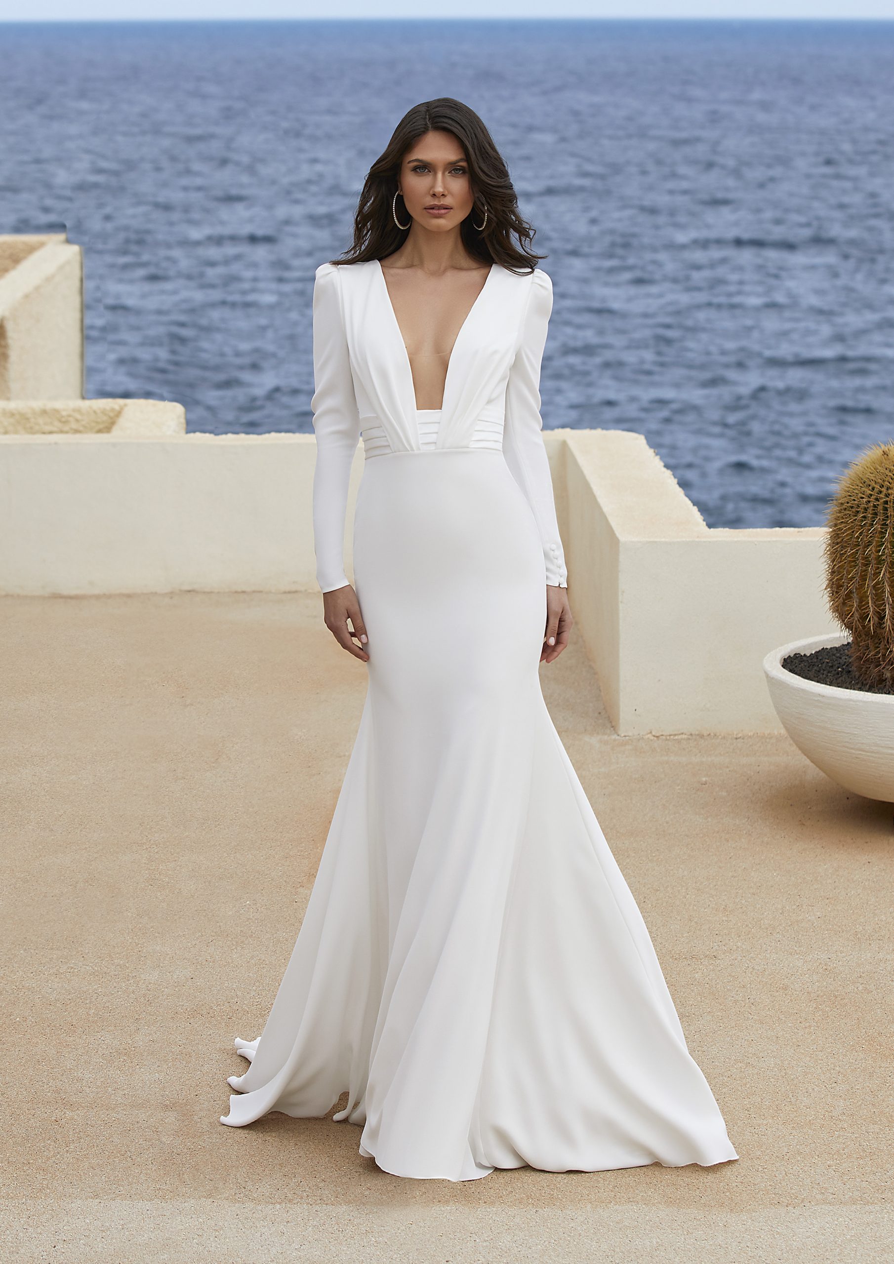 Model wears 2023 Modern Pronovias wedding dress ADRIENNE available at Romantique Bridal, Magherafelt, Northern Ireland
